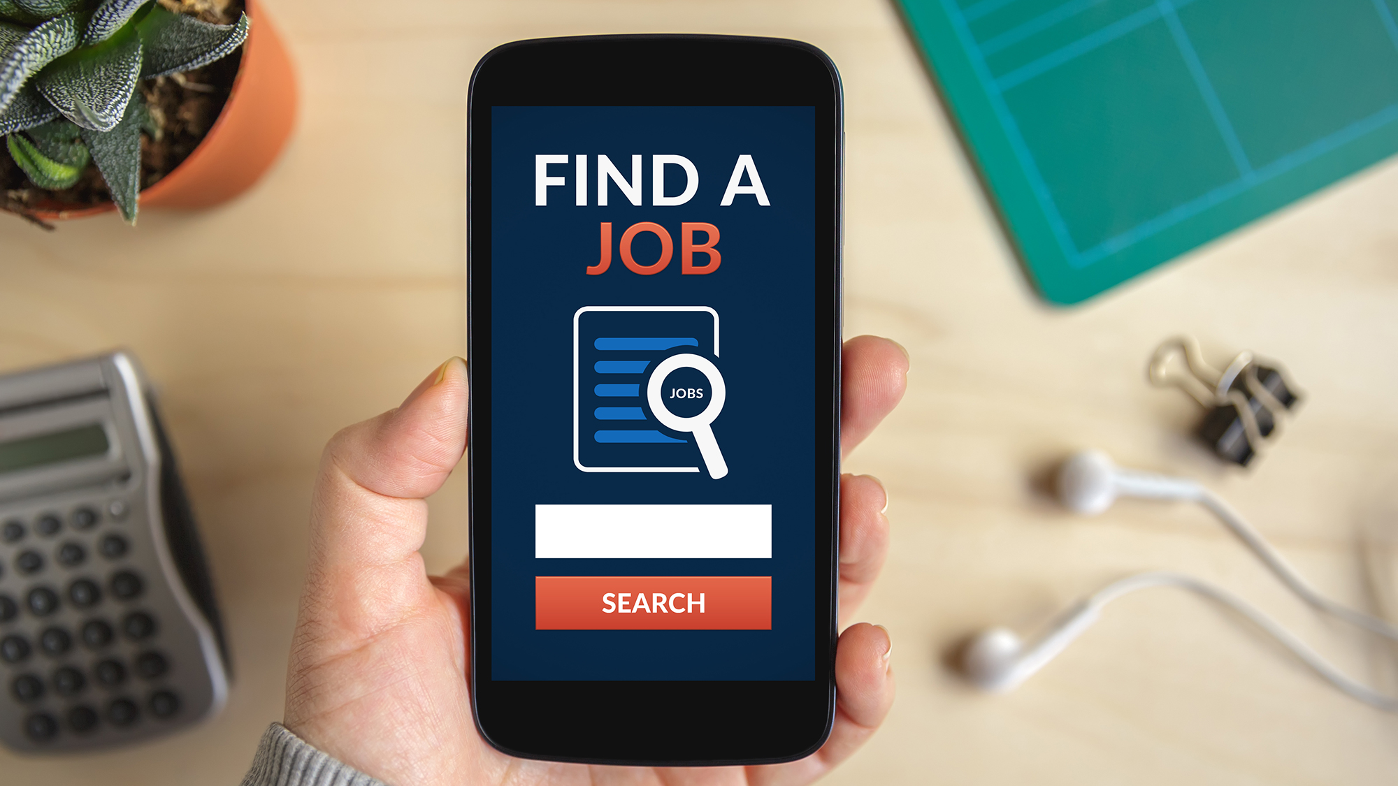 Handy mit App "Find a job" geöffnet